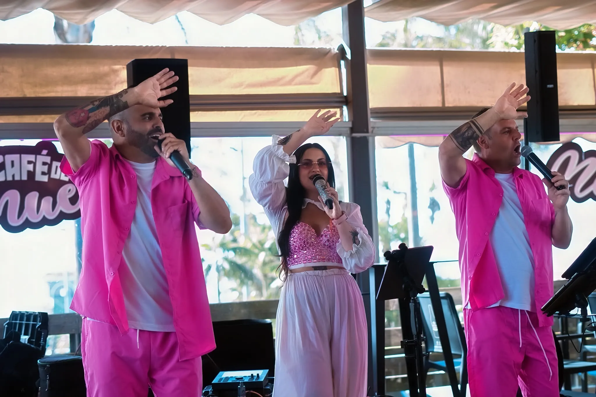 Grupo La Calle getting the crowd going with their arms in the air