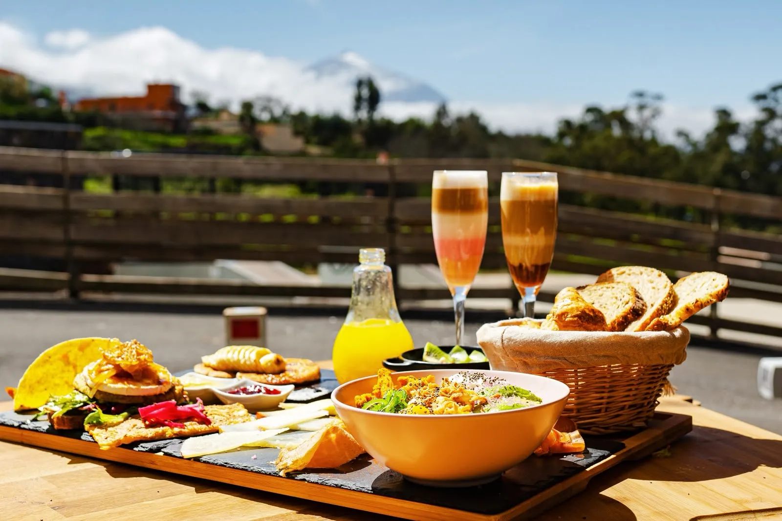 Brunch spread on the terrace, with Mount Teide behind